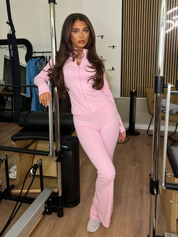 Pink Zip Jacket & Wide Leg Trouser Gym Set women's athleisure set, front view in Pilates studio