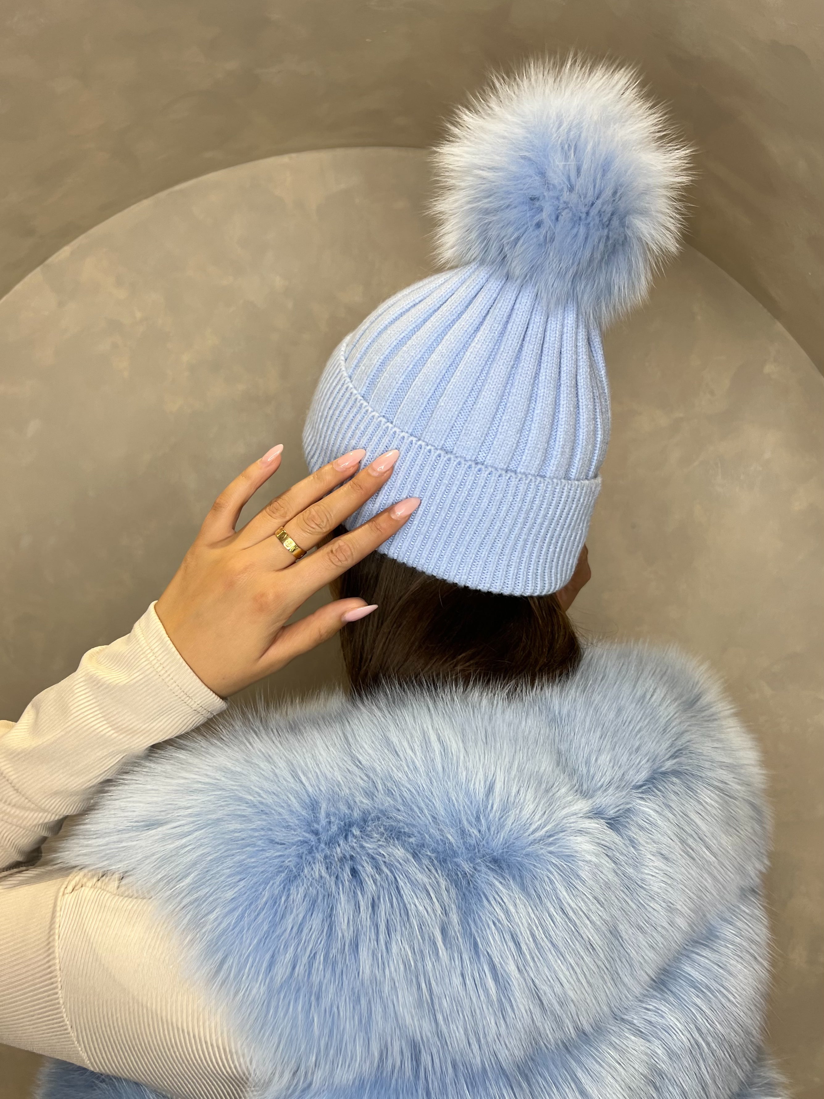 Baby blue bobble hat top