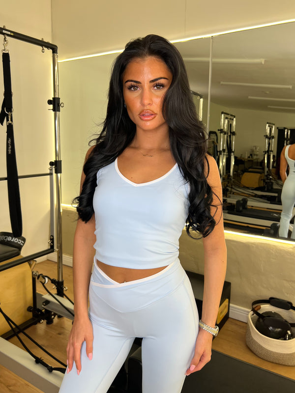 Baby Blue Piped Edge Gym Set activewear set, lifestyle Pilates studio setting