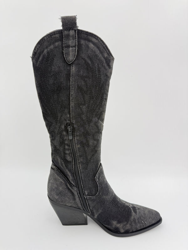 Black knee-high boot on a white background