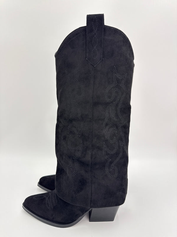 black shark fold over cowboy boot with decorative stitching on a white background