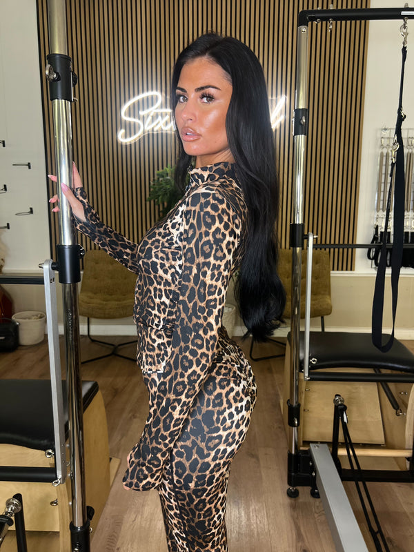 Leopard Zip Jacket Wide Leg Trouser Gym Set activewear set, lifestyle Pilates studio setting