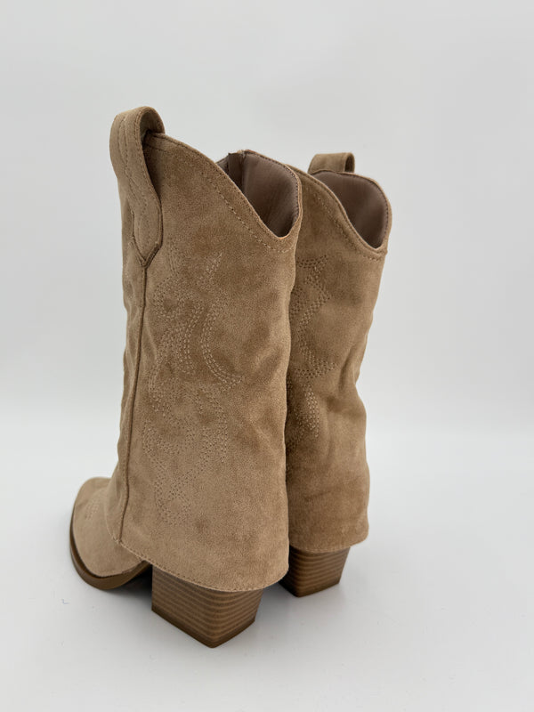 Dark beige shark fold over cowboy boot with decorative stitching on a white background