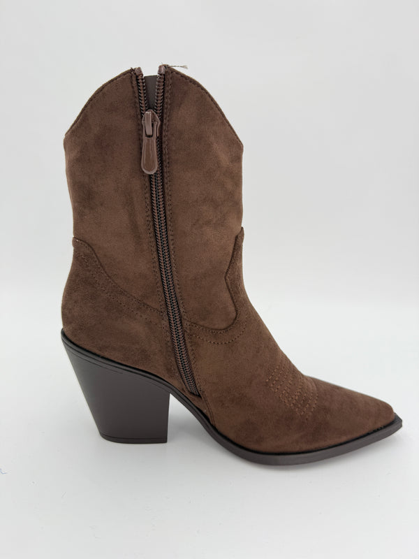Brown suede ankle cowboy boot with a block heel on a white background
