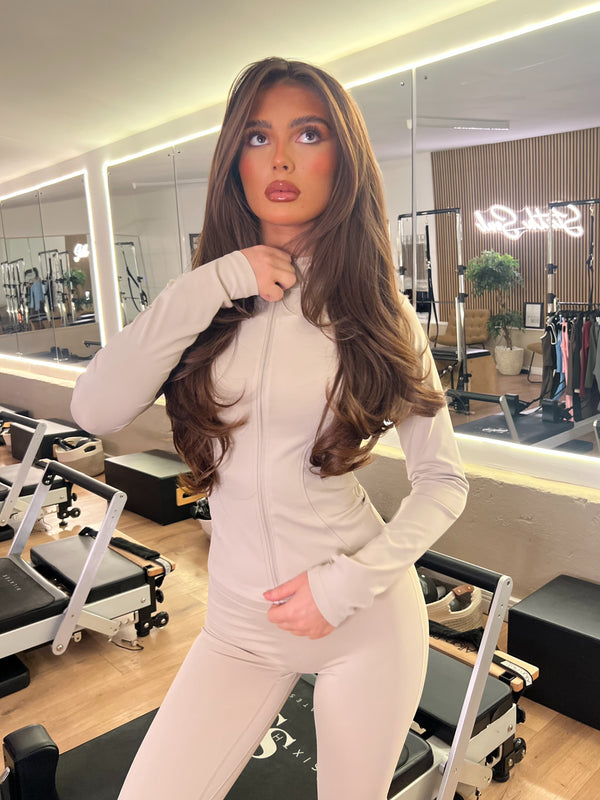 Beige Zip Jacket Wide Leg Trouser Gym Set athleisure outfit, angled studio view