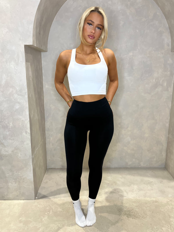 High Waisted Leggings women's athleisure set, front view in Pilates studio